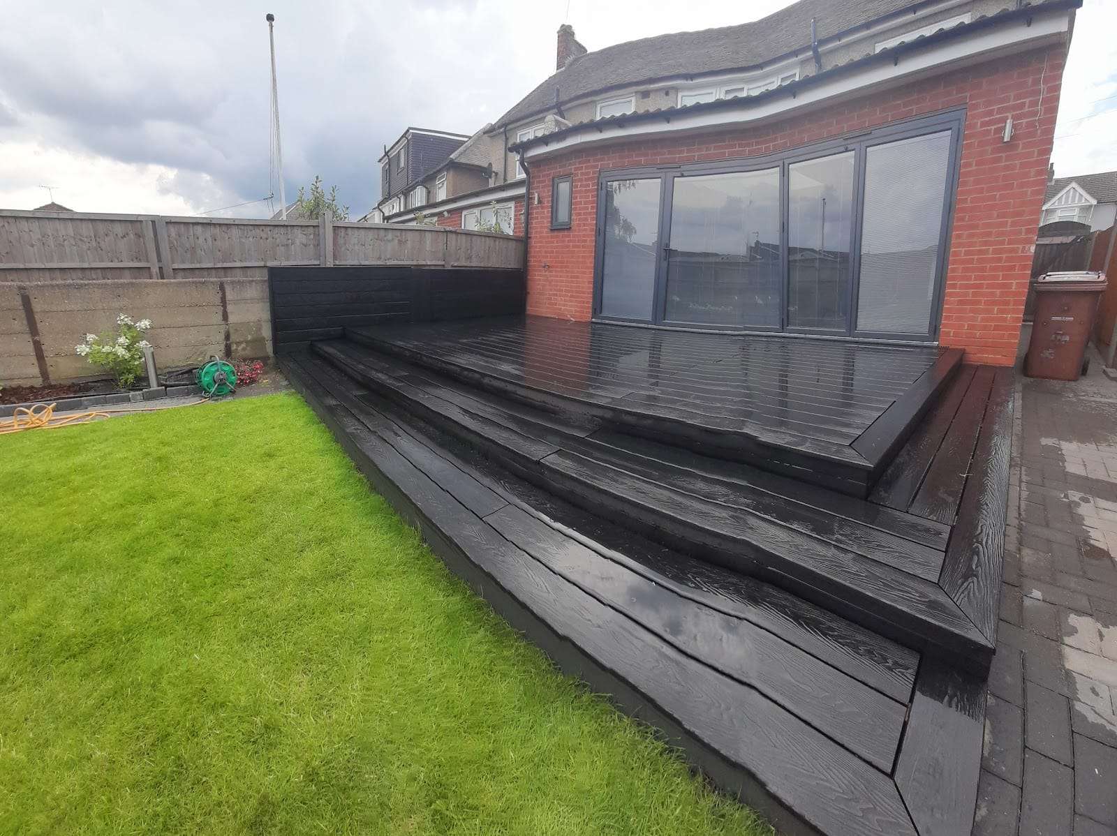 Rear extension with bifolds and deck, by R Construction Ltd